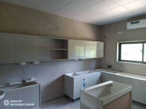 Inside of a lab room with some cabinetry added