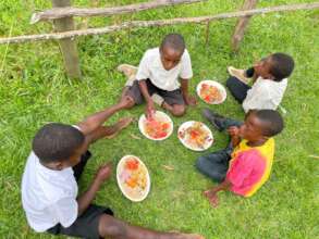 School children enjoy free school lunch