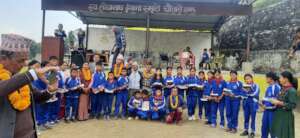 A group of students   received   school stationer