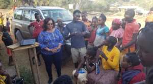 MHO director with local  communitie neat the park