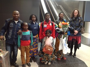 The newly-arrived family at Chicago O'Hare Airport