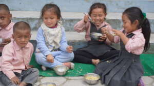 School Students Enjoying Meal at Panchakanya