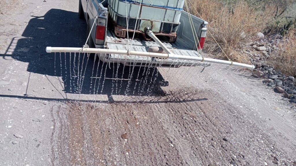 Simple irrigation system for the access road