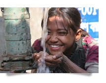 Girl With Safe Drinking Water after borewell repai