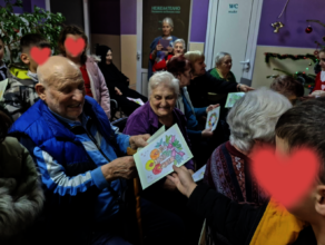 Young volunteers at a nursing home for Christmas