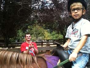 A rider who also volunteers helping another rider