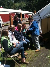 Music therapist leading camp songs
