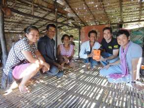 with a family that just received solar lighting