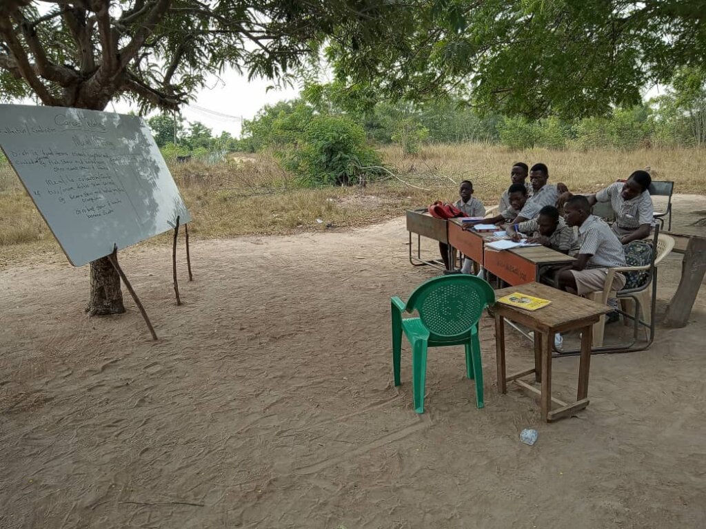 Children learning with available resources!