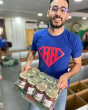 Strong volunteers make sure we get tomato sauces!