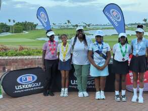 Coach Munnings with Girls 11-12 Division