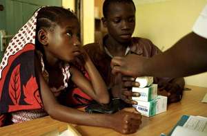 Fatuma and siblings receiving their free medicatio