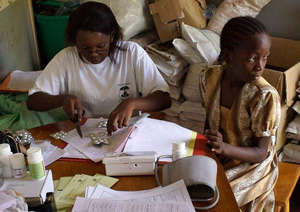 Millicent receiving her meds at a clinic