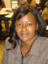 Olive M., Coach