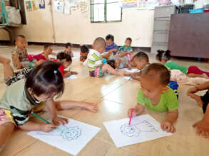 Children are practicing hand muscles for writing