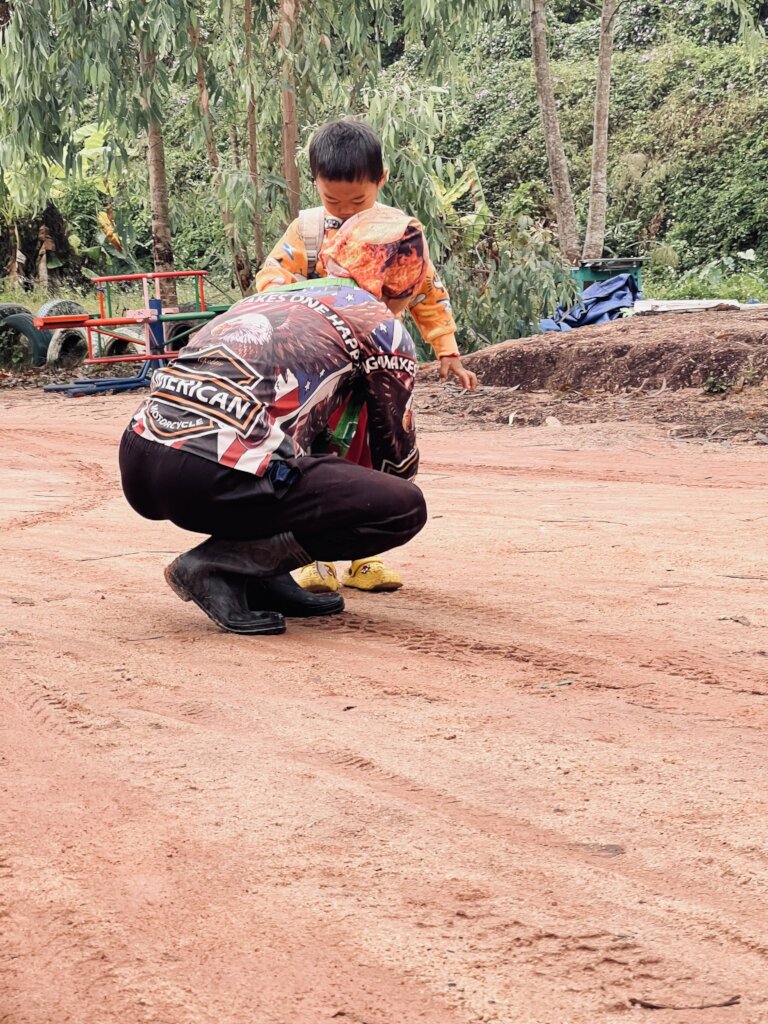 Migrant parents drop children before work.