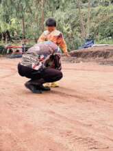 Migrant parents drop children before work.