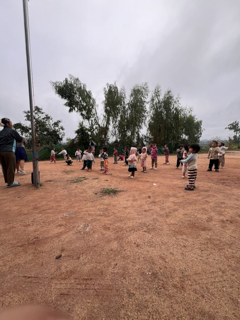 Children line up for morning exercise.