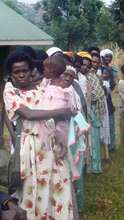 Pregnant Women and Mothers Receiving Nets