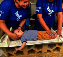 Health Promoters assessing the patient