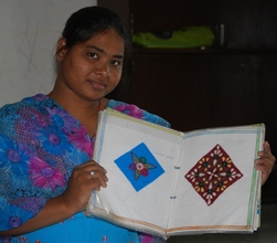 Anita showing her file of embroidery stitches