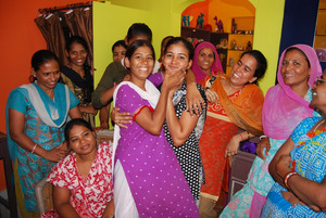 Graduates having fun at the new shop opening