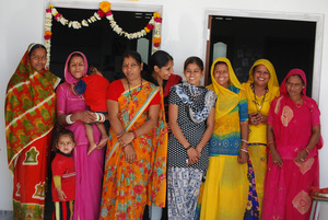 Graduates outside the new sewing centre