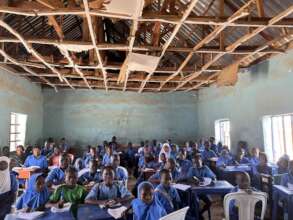 Children in a dilapidated classroom