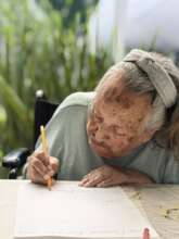 Rosita in a writing workshop.