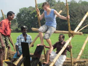 Foreigner in wooden paddy wheels