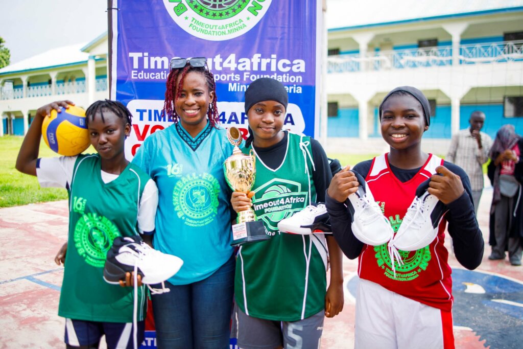 One of our coaches with the girls.