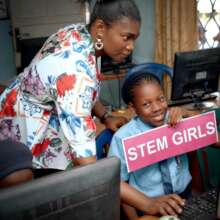 Girl learning computer skils