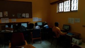 Unemployed Members on Computers Looking for Jobs