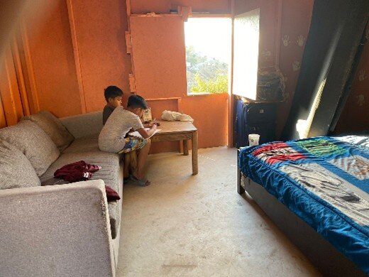 Kids doing homework with their new floor