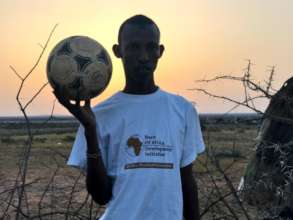 Asugo with his only tool football