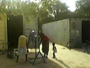 Bicycle Repair in Action-B4HGA container on right