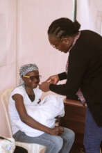 A patient getting eye screening