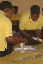 Issuing loans at an SHG meeting