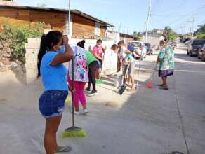 Women cleaning their locality