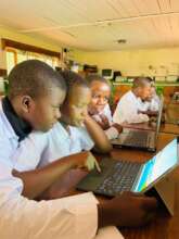 STUDENTS AND OLD COMPUTERS