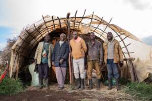 CFA members next to their produce storage