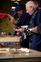 Senior at a soup kitchen