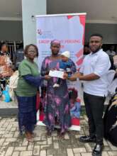 LHCHF staff presenting PTAP grant at ABAT hospital