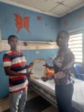 The lady Helen staff presenting PTAP grant