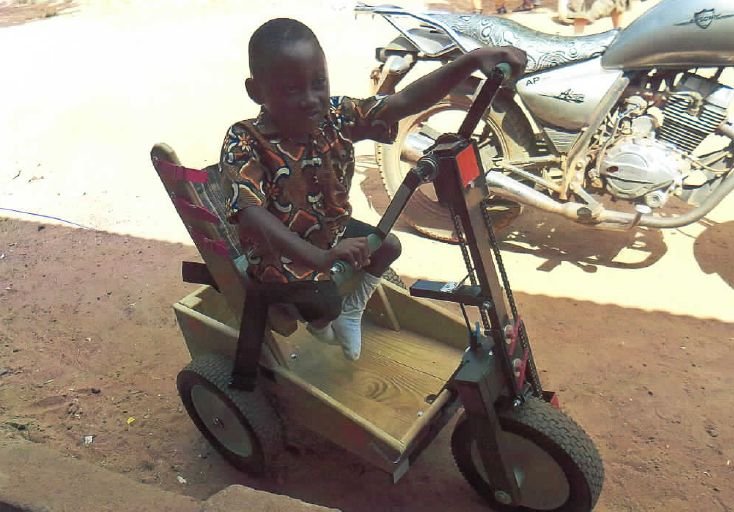 This boy's legs are small compared to his body.