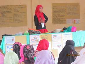Jopay facilitating a training for young women
