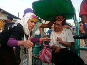 Ash distributes relief in Northern Cebu