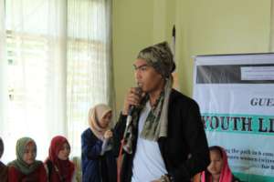 Hamza facilitating a youth listening session