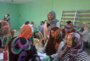 Hanah (Standing) working with reading facilitators