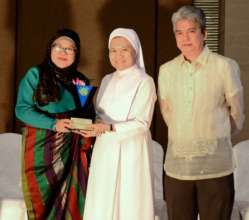 Mariam being presented with SOV award